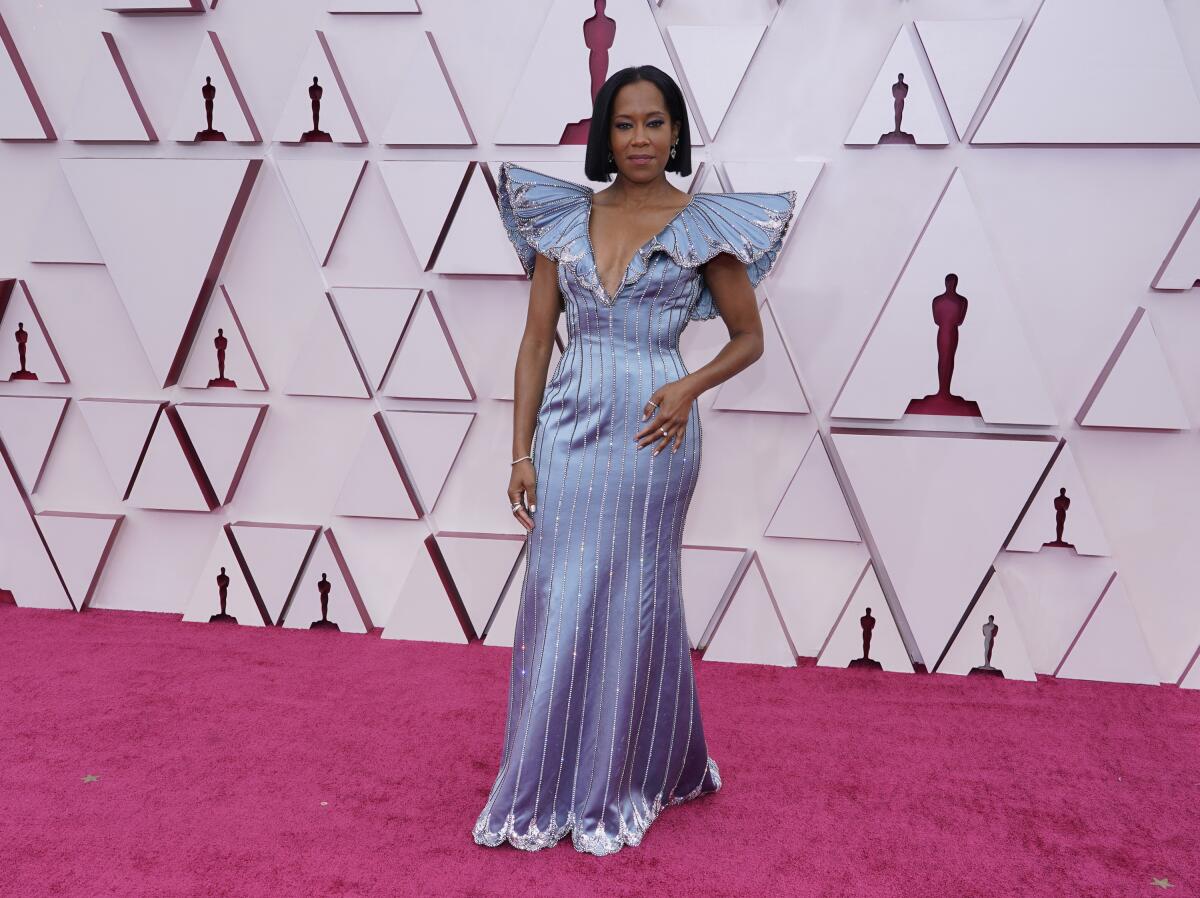 Regina King Wows in a Baby Blue Butterfly Gown at the Oscars 2021 –  Footwear News