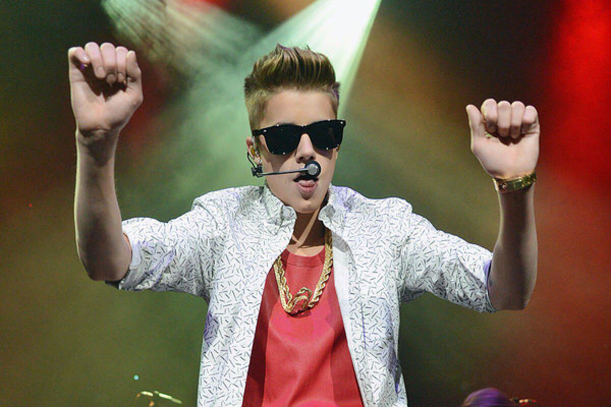 Justin Bieber performs at the Q102 Jingle Ball 2012 in Philadelphia.