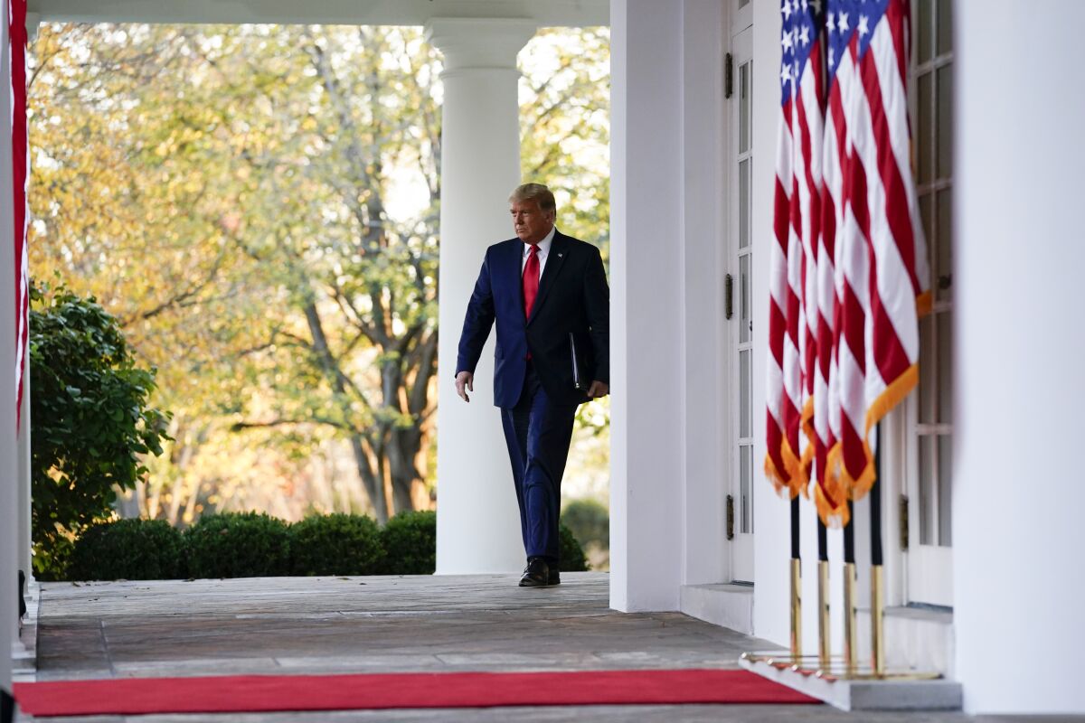 President Trump arrives to speak in the Rose Garden of the White House on Nov. 13. 