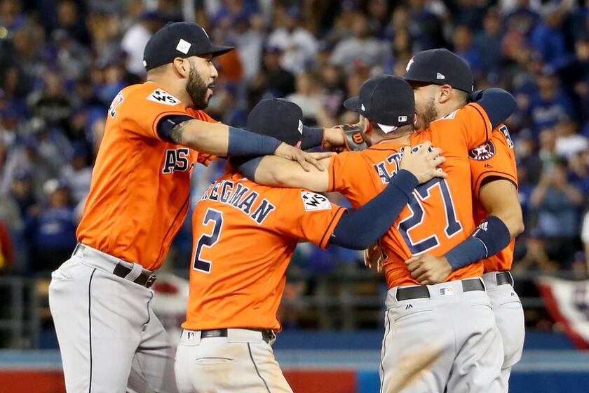 LOS ANGELES, CA - NOVEMBER 01: Marwin Gonzalez #9, Alex Bregman #2, Jose Altuve #27, and Carlos Correa #1 of the Houston Astros celebrate defeating the Los Angeles Dodgers 5-1 in game seven to win the 2017 World Series at Dodger Stadium on November 1, 2017 in Los Angeles, California. (Photo by Ezra Shaw/Getty Images) ** OUTS - ELSENT, FPG, CM - OUTS * NM, PH, VA if sourced by CT, LA or MoD **