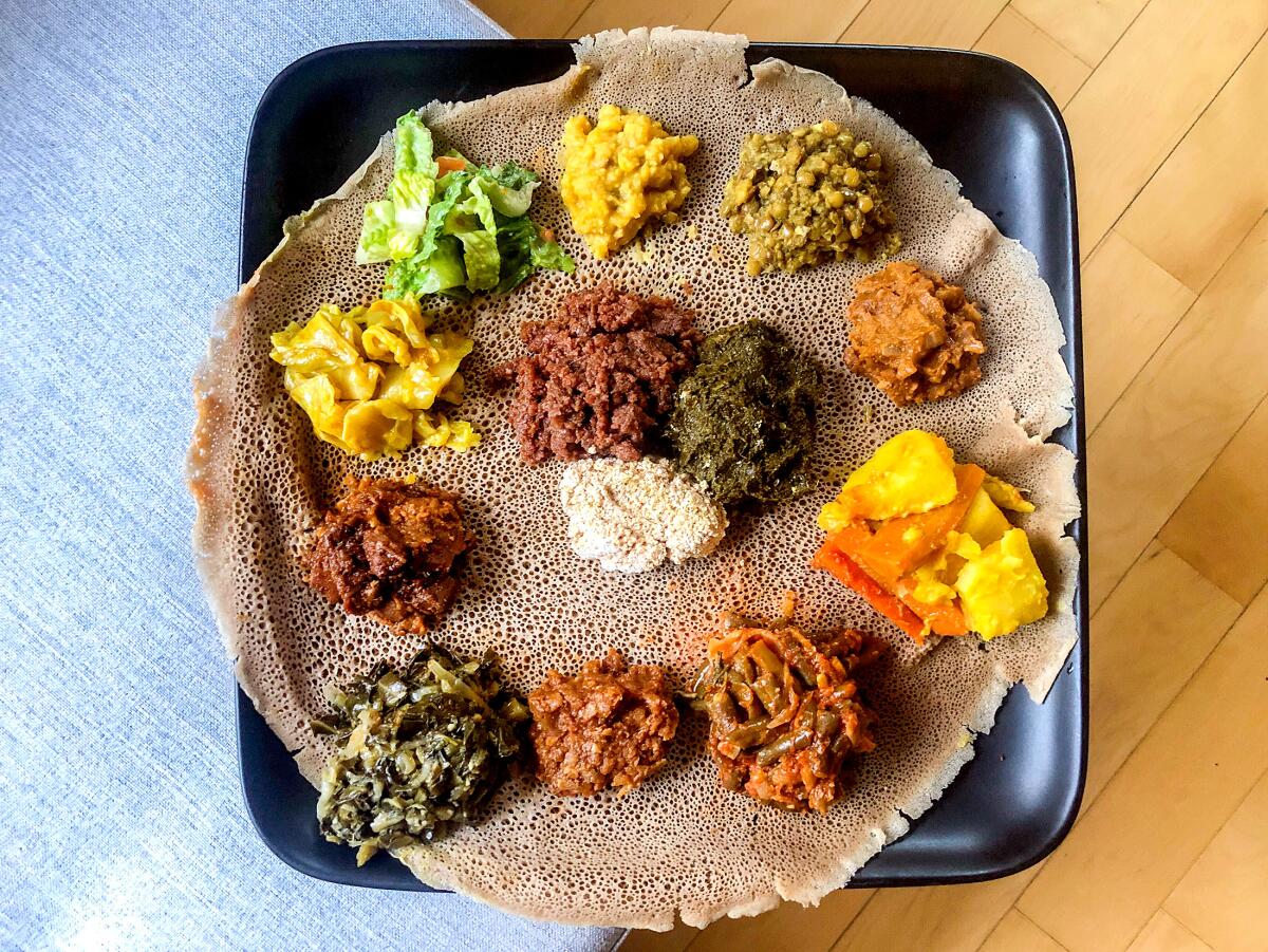 Vegetarian utopia takeaway platter from Lalibela in Little Ethiopia, replated at home.