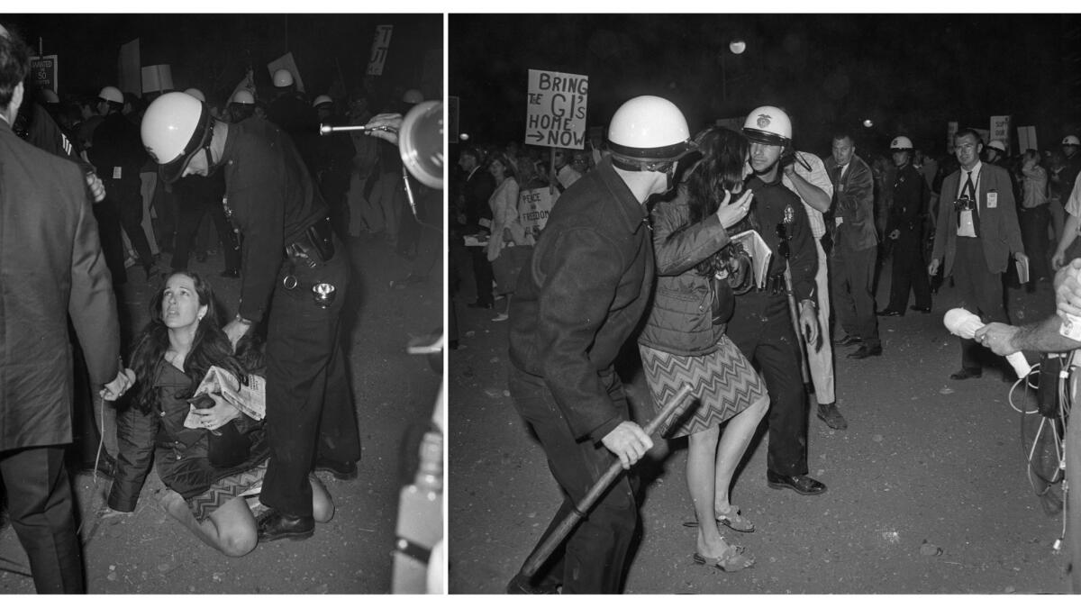 June 23, 1967: A protester is removed from Century Plaza during a speech by President Lyndon Johnson.