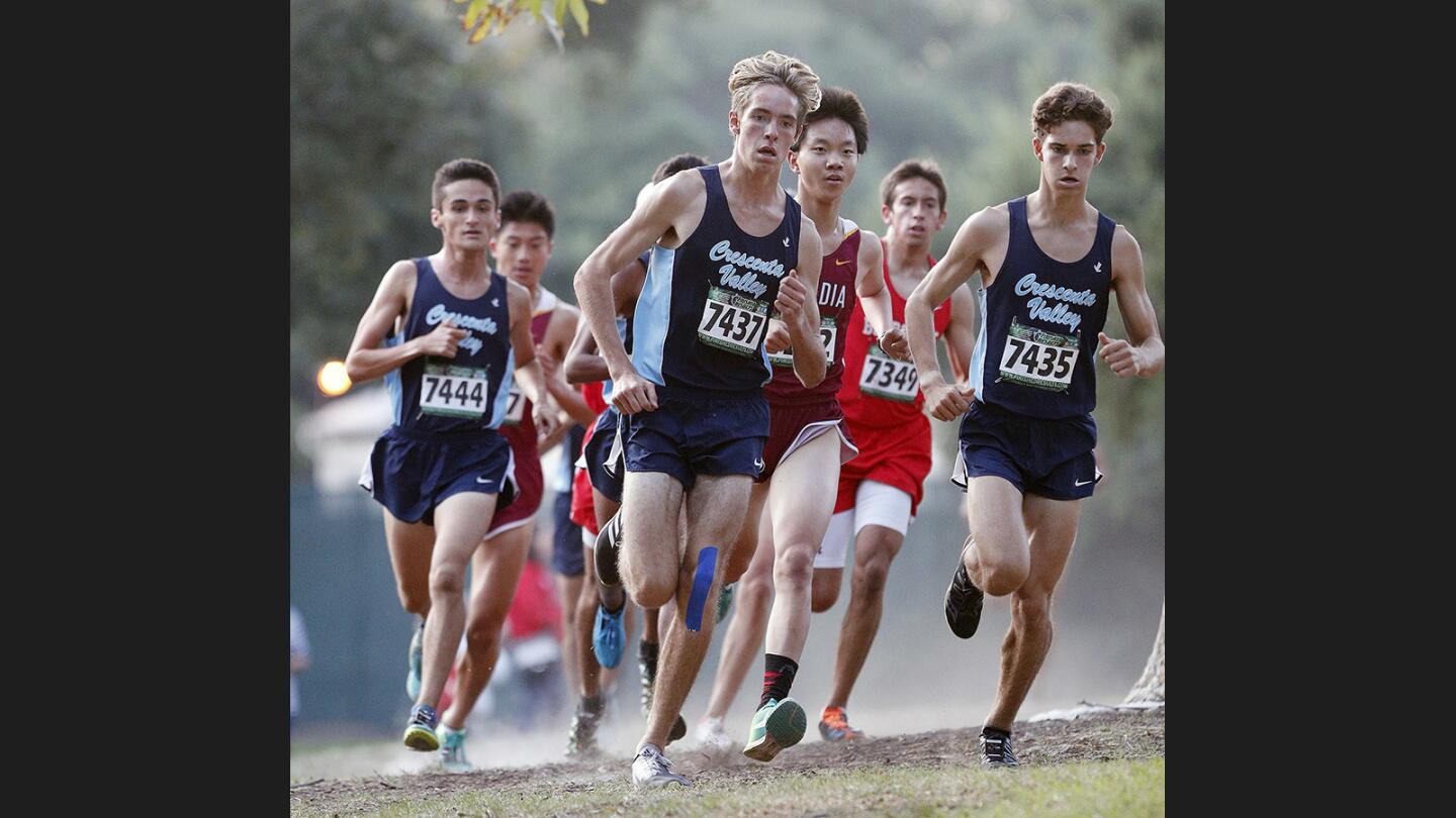 The leaders round a corner in a Pacific League boys' cross country meet at Crescenta Valley Regional Park on Thursday, October 12, 2017.
