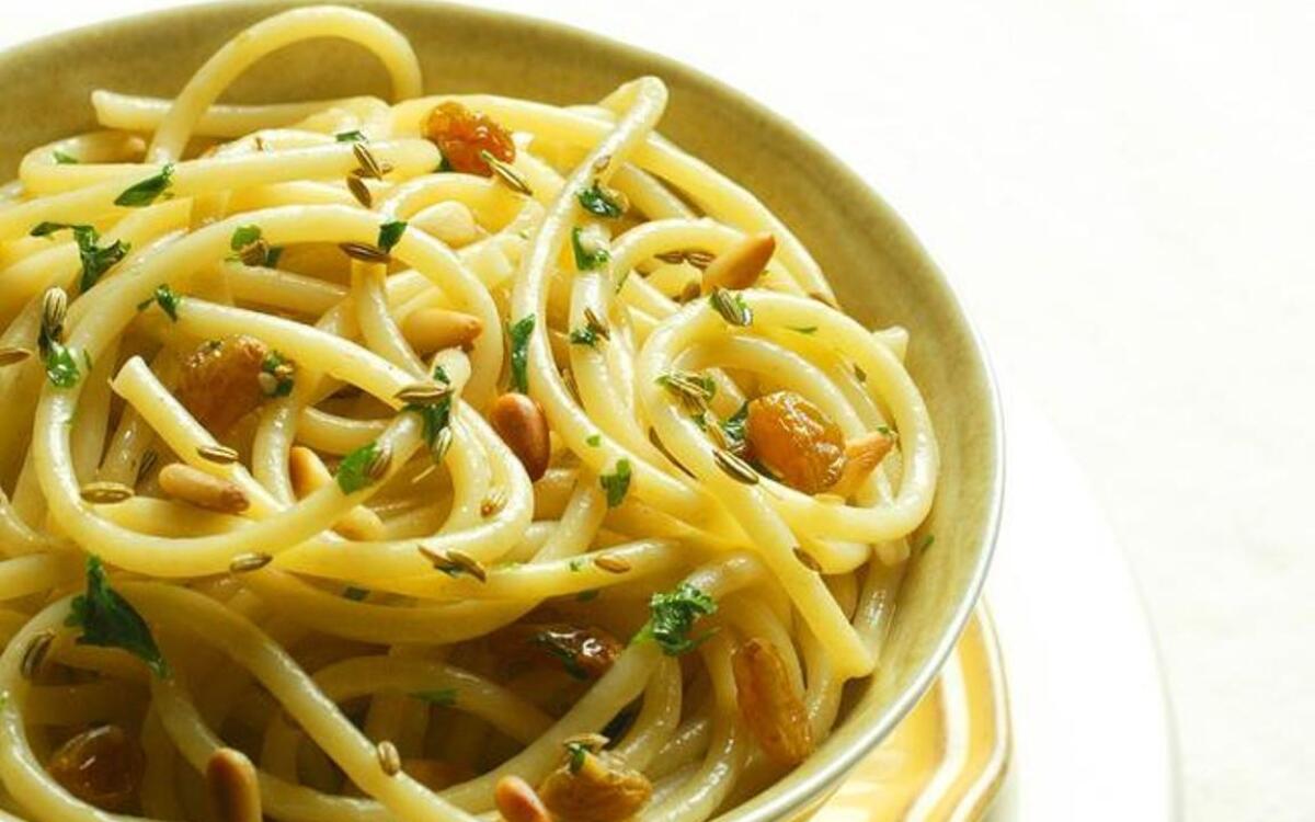 Bucatini with golden raisins, fennel and pine nuts