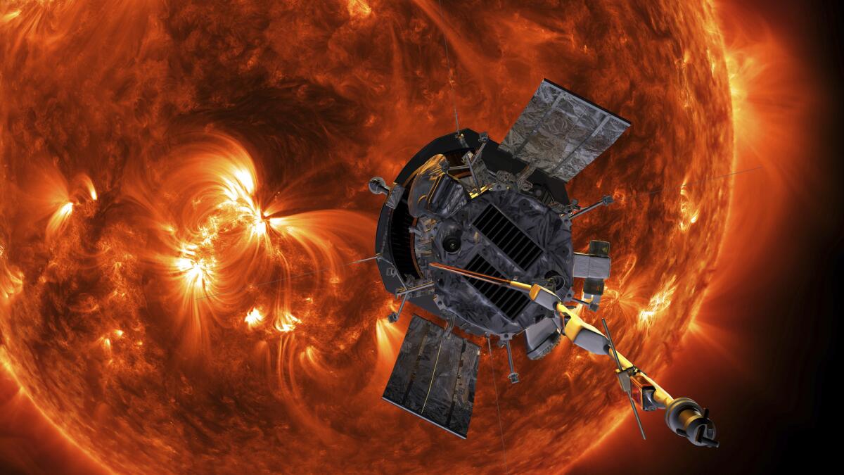 An artist's rendering made available by NASA shows the Parker Solar Probe approaching the sun.
