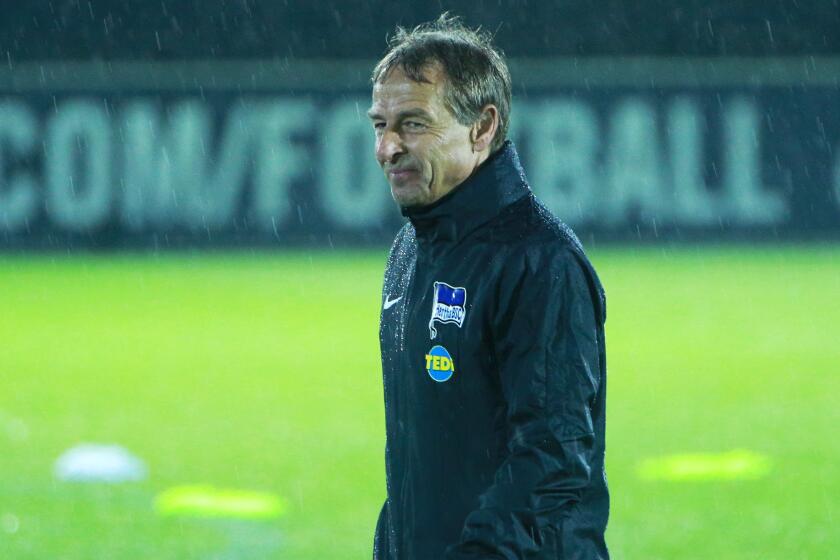 BERLIN, GERMANY - NOVEMBER 27: Juergen Klinsmann walks on the lawn during a training session on November 27, 2019 in Berlin, Germany. (Photo by Christian Marquardt/Bongarts/Getty Images)