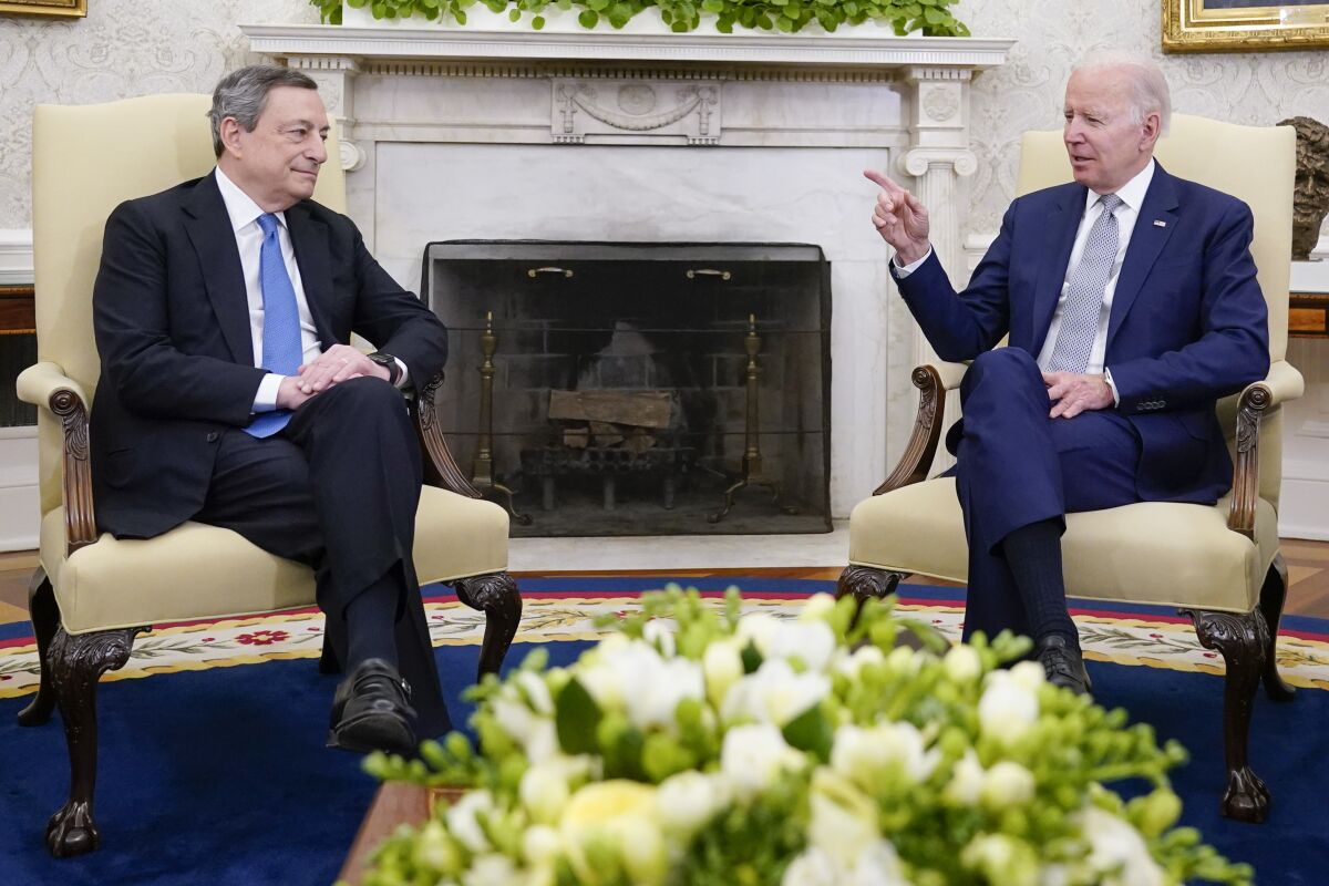President Joe Biden and Italy's Prime Minister Mario Draghi meet in the Oval Office of the White House, Tuesday, May 10, 2022, in Washington. (AP Photo/Manuel Balce Ceneta)