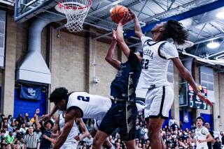 Sierra Canyon's Jayden Alexander gets block against Sherman Oaks Notre Dame. The Trailblazers are the new No. 1 team i