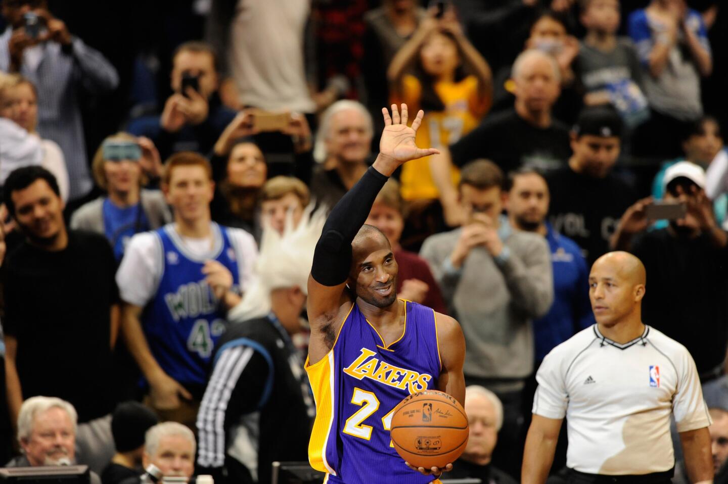 Lakers guard Kobe Bryant acknowledges the Minnesota crowd after passing Michael Jordan on the NBA all-time scoring list.