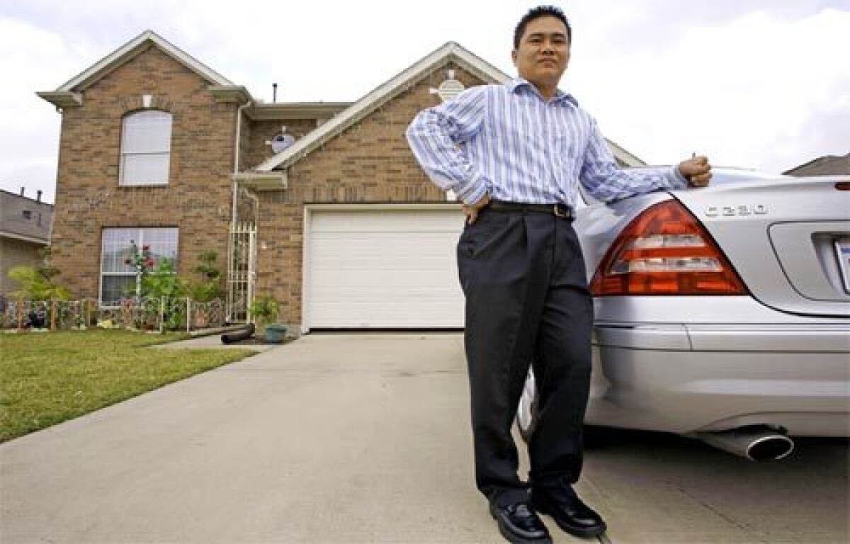 A RELATIVE BARGAIN: Vincent Ho, 36, bought this house in Houston for $175,000, which is three times larger than the El Monte house he sold for $600,000. He used the rest of the money to expand his Orange County-based business to the Texas city.