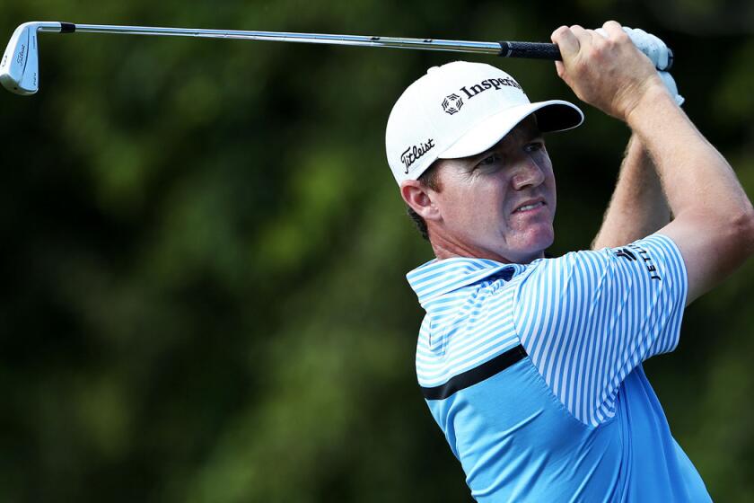 Jimmy Walker hits his tee shot at No. 15 on Saturday during the third round of the Sony Open at Waialae Country Club.