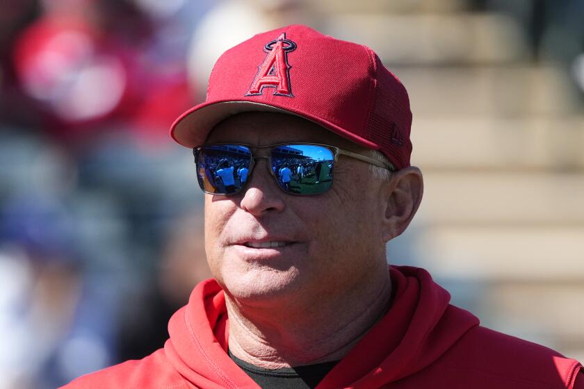 Los Angeles Angels manager Phil Nevin walks to the dugout prior to a spring training baseball game against the Los Angeles Dodgers Friday, March 3, 2023, in Tempe, Ariz. (AP Photo/Ross D. Franklin)