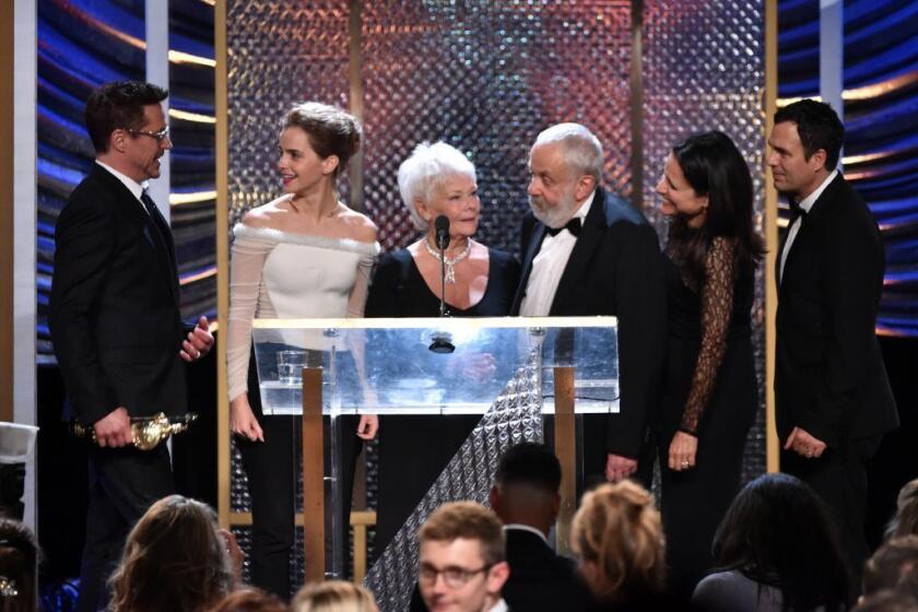 The winners of the BAFTA Los Angeles' Britannia Awards gather on stage at the Beverly Hilton Hotel on Thursday evening. From left are Robert Downy Jr., Emma Watson, Judi Dench, Mike Leigh, Julia Louis-Dreyfus and Mark Ruffalo.