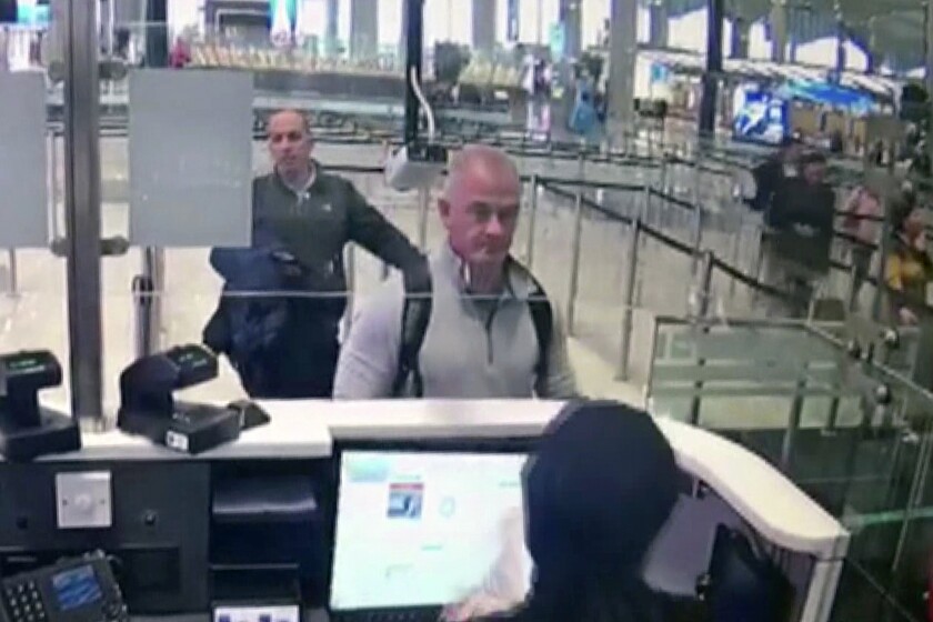 Two men at passport control at Istanbul Airport in Turkey