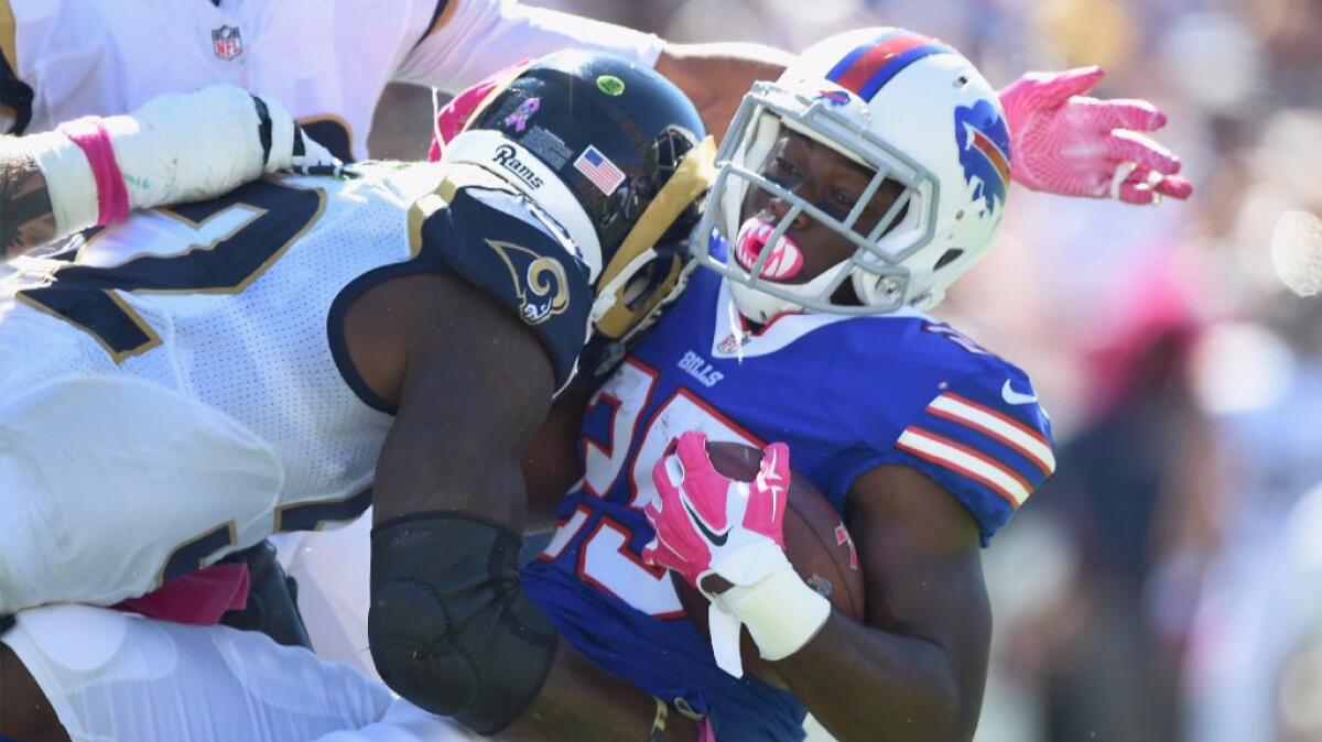 Rams cornerback Troy Hill hits Bills running back LeSean McCoy during a game on Oct. 9.