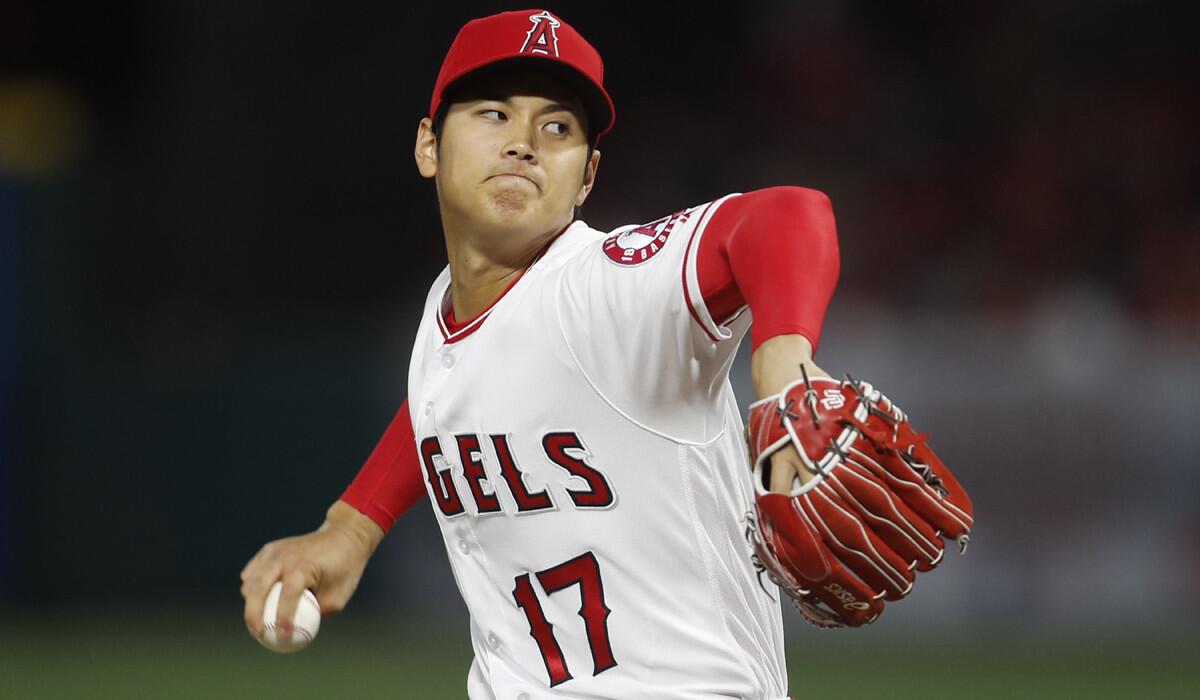 The Angels' Shohei Ohtani delivers a pitch against the Red Sox on April 17, 2018. 