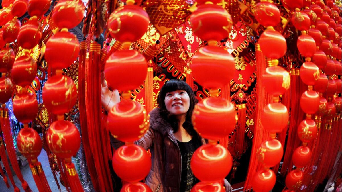 A customer browses in Yiwu, China, prior to new year celebrations.