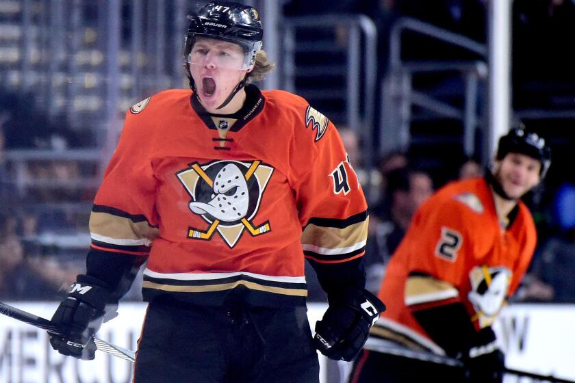 Defenseman Hampus Lindholm, left, and the Ducks are trying to work out a deal worth around $6 million per season.