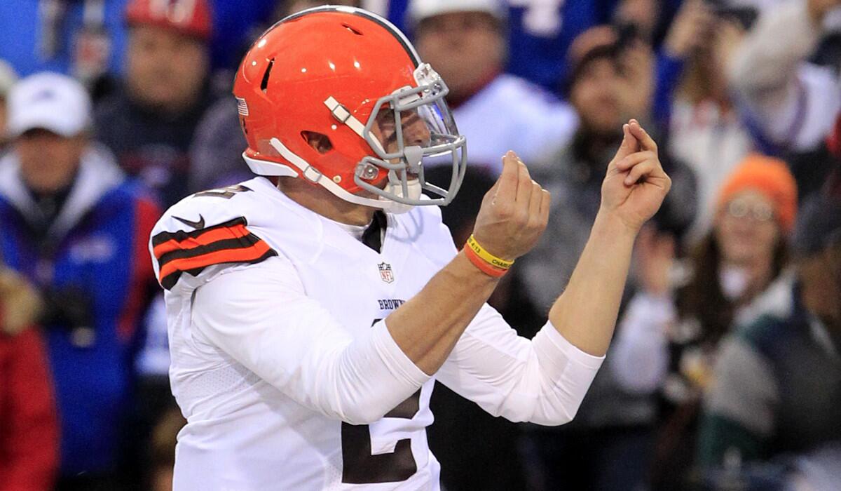 Cleveland Browns quarterback Johnny Manziel celebrates after scoring a touchdown against the Buffalo Bills in the fourth quarter Sunday.