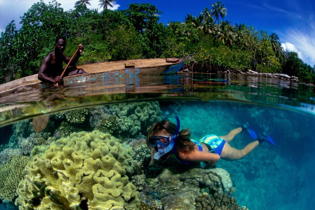 Snorkeling at Mushroom Island, Munda, Solomon Islands.