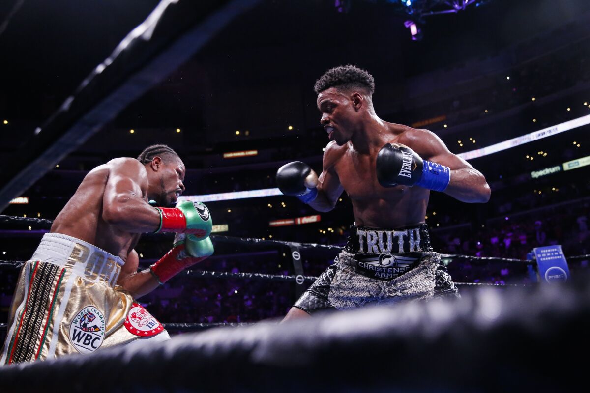 Errol Spence Jr. fights against Shawn Porter during the WBC & IBF World Welterweight Championship.