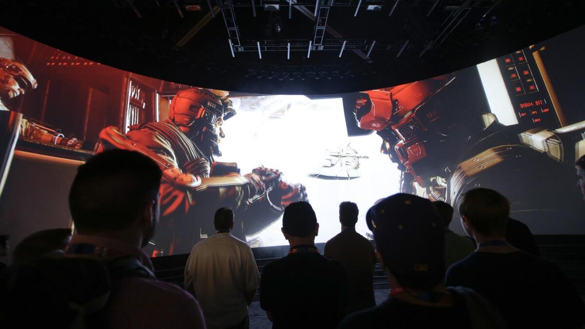 A "Call of Duty: Advanced Warfare" video game trailer is displayed at the Activision booth at the Electronic Entertainment Expo in 2014 in Los Angeles.