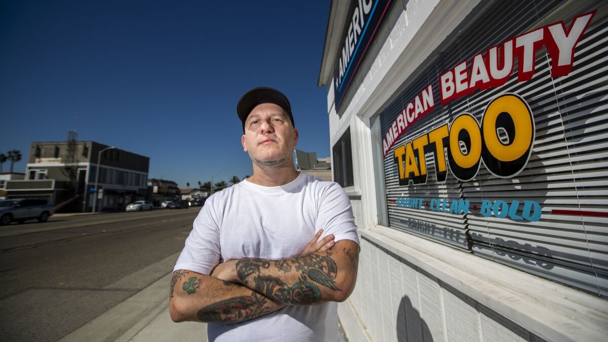 James Real, the owner of American Beauty Tattoo in Sunset Beach, said he saw L.A. County sheriff's deputies come into his shop to get inked with identical tattoos of a skeleton in a cowboy hat. Each design included a number in sequential order — more than 100 in all.