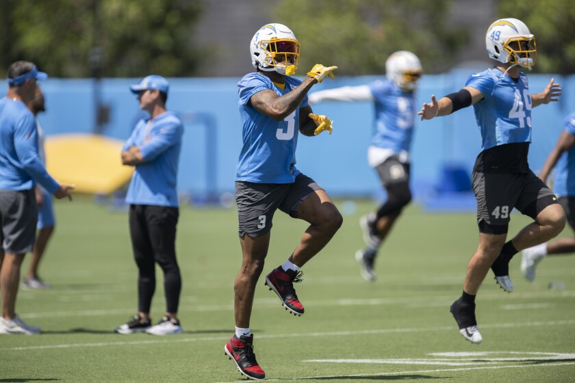 Chargers Free safety Derwin James (3) warms up during drills in training.