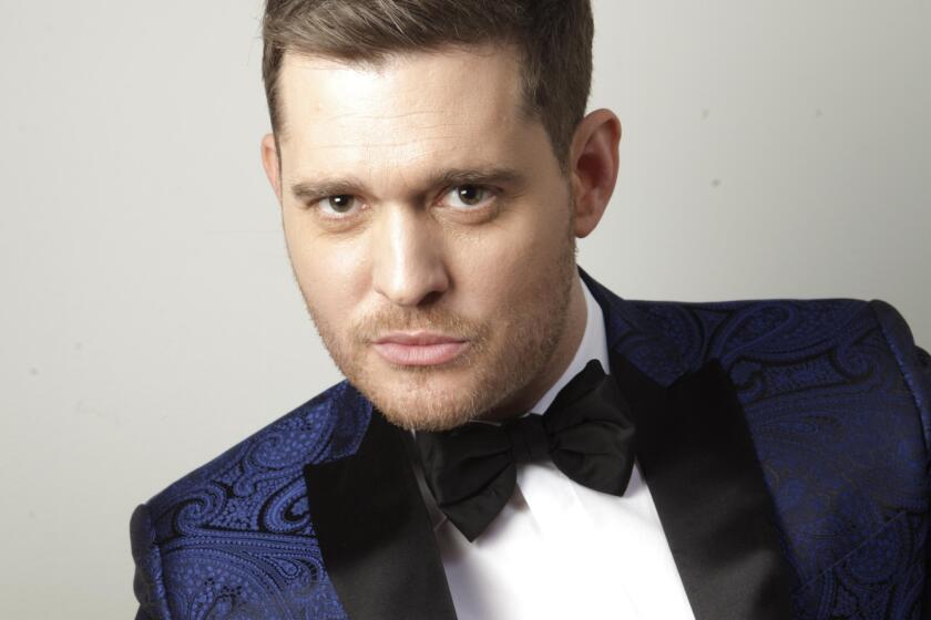 An Instagram photo posted by singer Michael Bublé garners fat-shaming accusations.