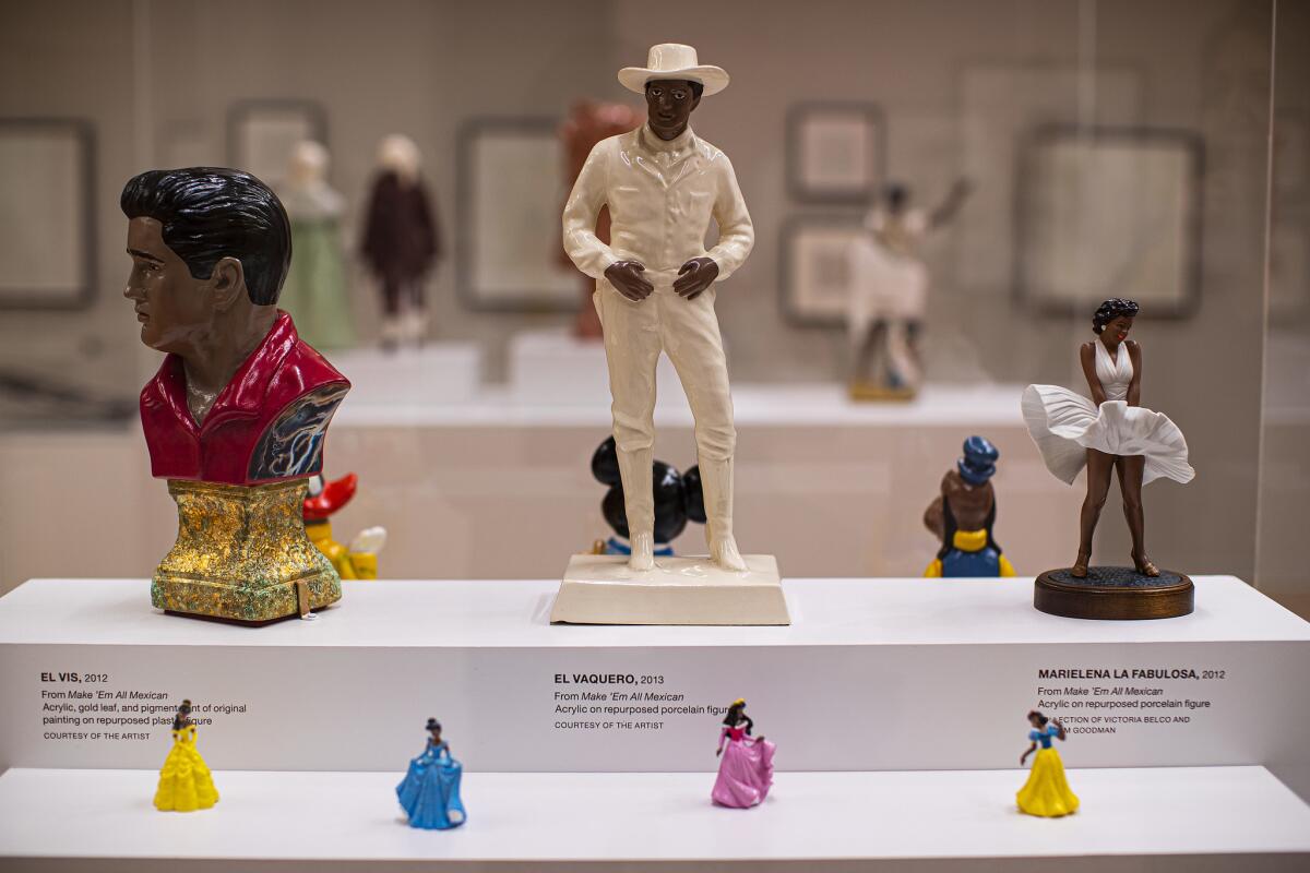 Brown Elvis, brown cowboy and brown Marilyn in Linda Vallejo's "Make 'Em All Mexican" series, one of four on view at LA Plaza de Cultura y Artes.