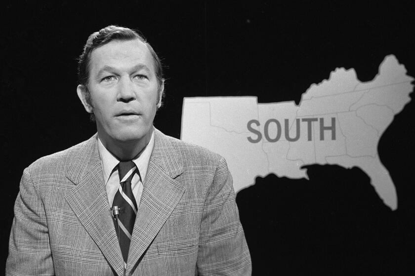 Roger Mudd preparing for CBS News election coverage in October 1974.