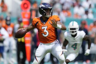 Denver Broncos quarterback Russell Wilson (3) aims a pass during the first half of an NFL football game against the Miami Dolphins, Sunday, Sept. 24, 2023, in Miami Gardens, Fla. (AP Photo/Rebecca Blackwell)