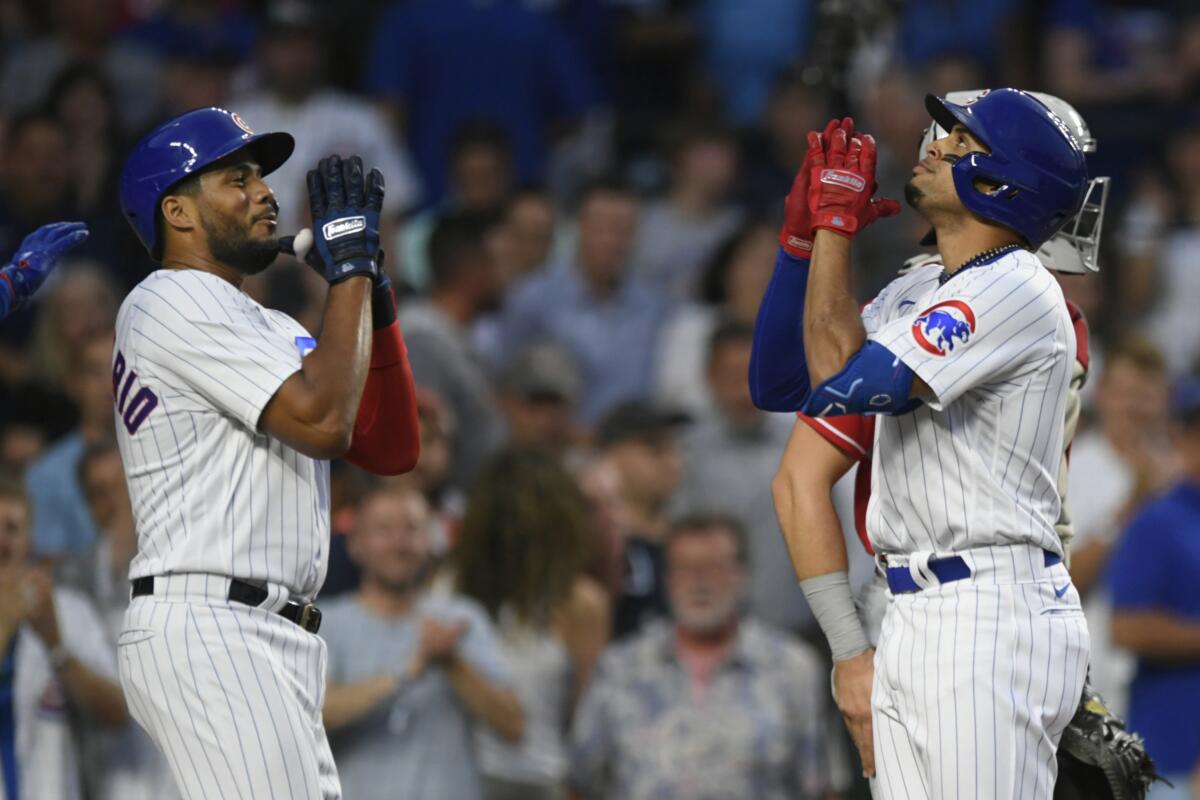 Jeimer Candelario of the Chicago Cubs celebrates his fourth inning