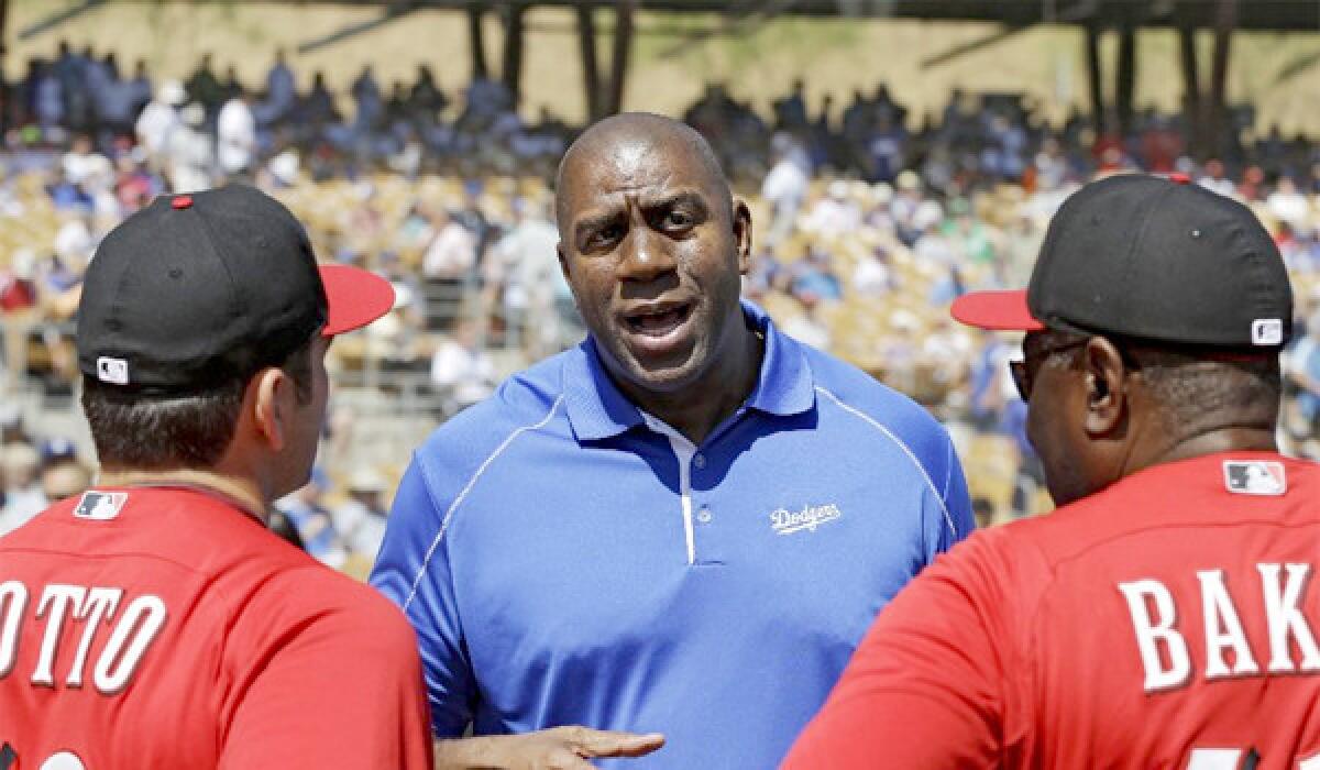 Magic Johnson says that there have been no discussions between the Dodgers' ownership group and the NFL about a potential football stadium at Chavez Ravine.
