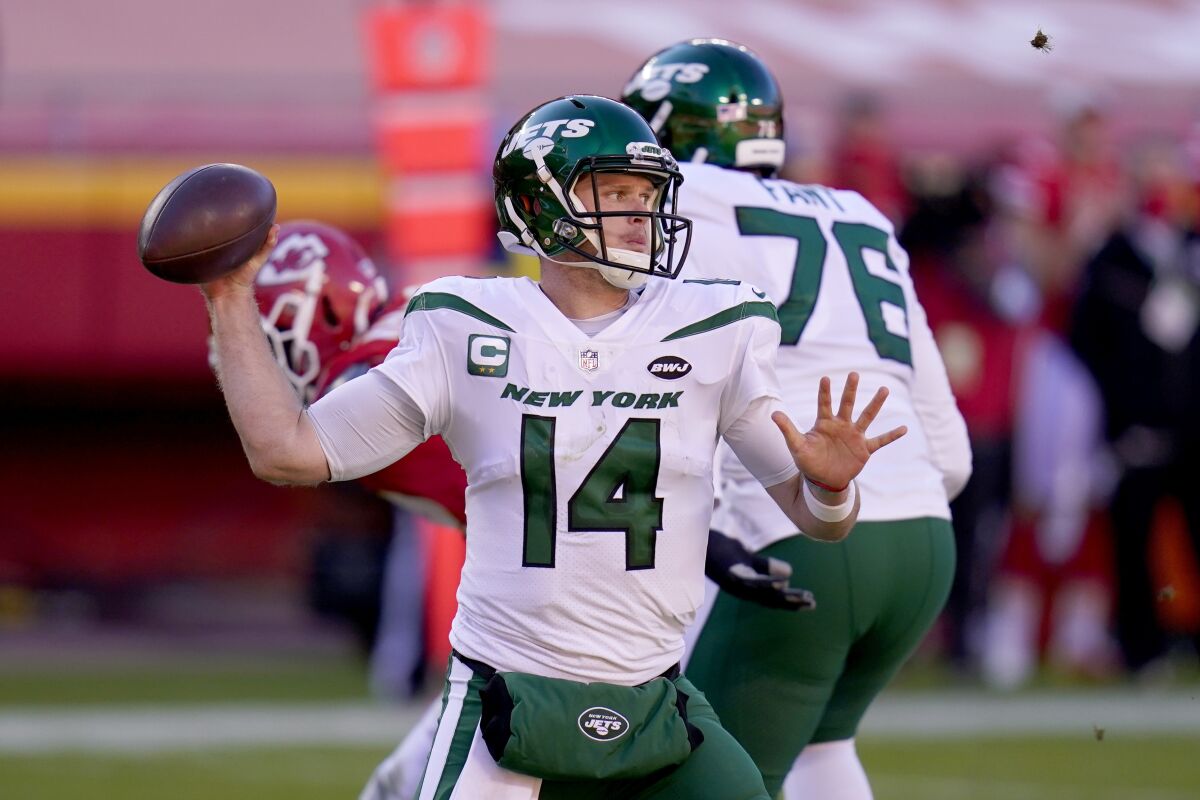 New York Jets quarterback Sam Darnold (14) throws a pass in the second half of an NFL football game against the Kansas City Chiefs on Sunday, Nov. 1, 2020, in Kansas City, Mo. (AP Photo/Jeff Roberson)