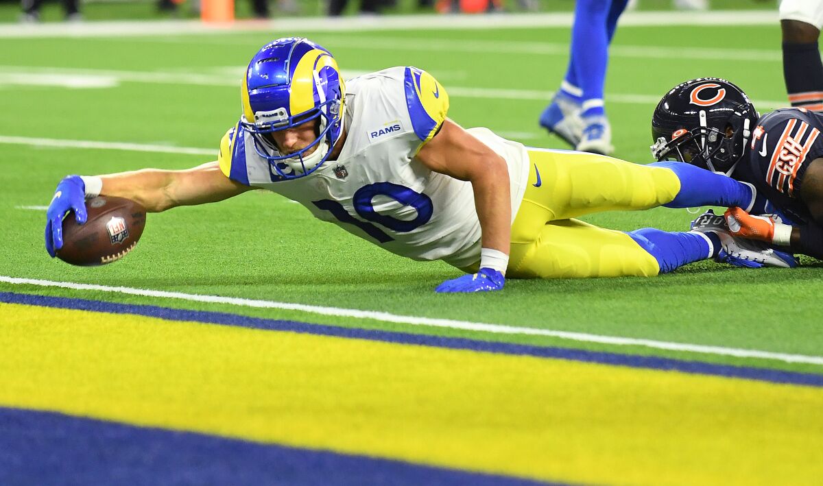 Rams wide receiver Cooper Kupp stretches for the end zone against the Chicago Bears on Sunday.