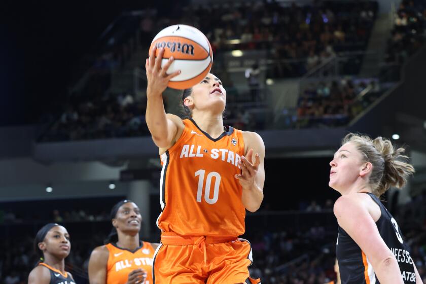 Aces guard Kelsey Plum scores on a layup for Team Wilson in the WNBA All-Star Game on July 10, 2022, at Wintrust Arena.