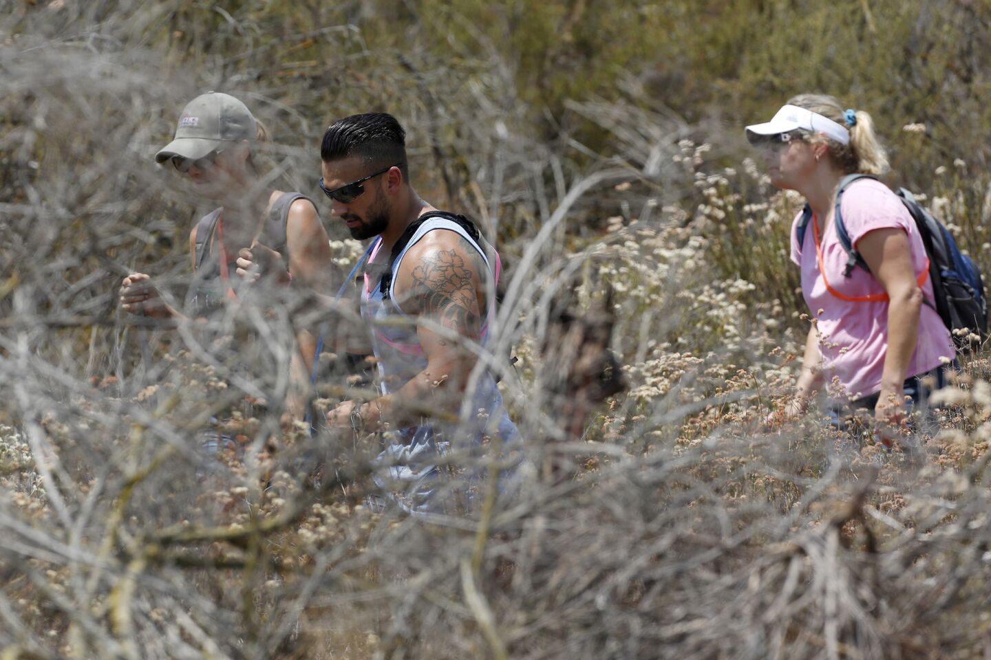 Volunteers ventured out under blazing sun to look for missing 11-year-old Terry Dewayne Smith.
