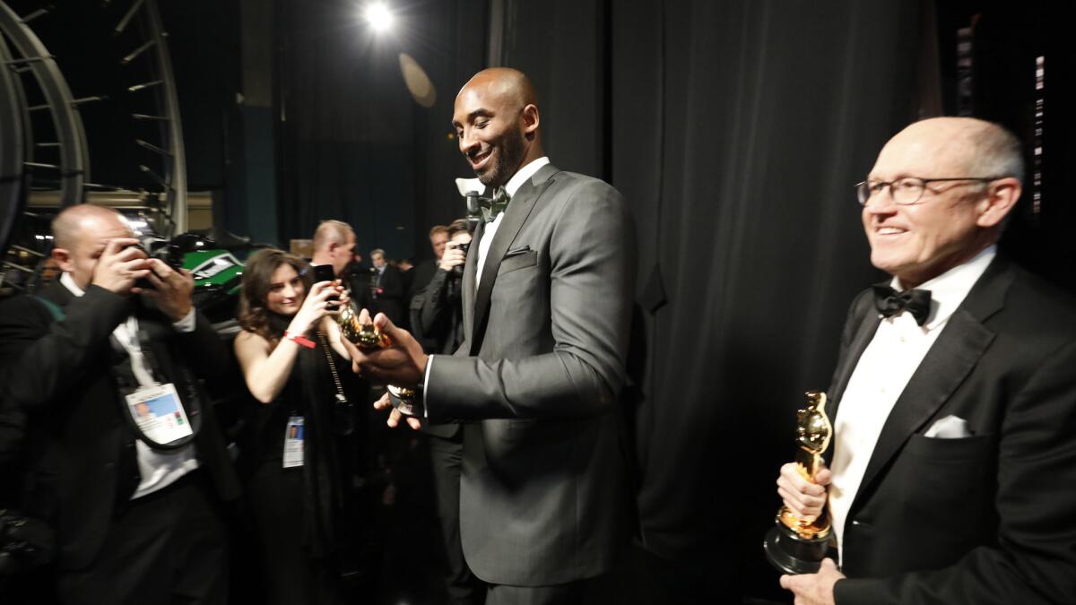 Kobe Bryant with Glen Keane backstage at the Academy Awards in March 2018, after they won the animated short Oscar for "Dear Basketball."