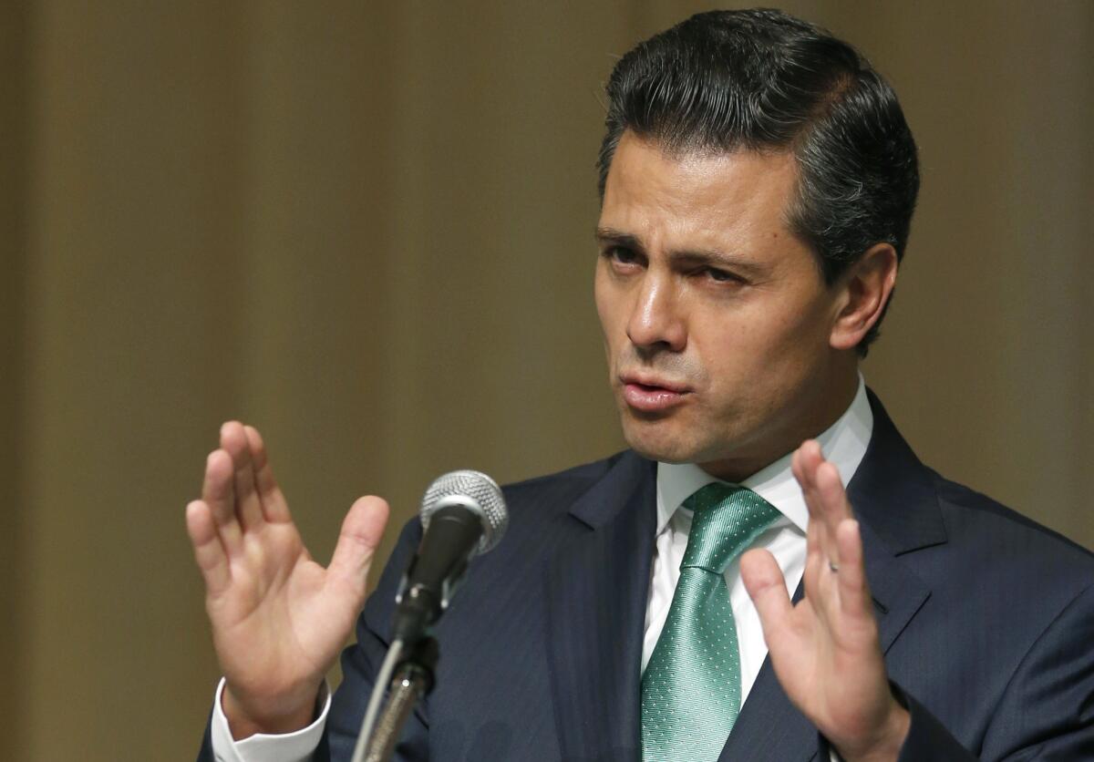 Mexico's President Enrique Peña Nieto speaks during a lecture at United Nations University in Tokyo on Tuesday.
