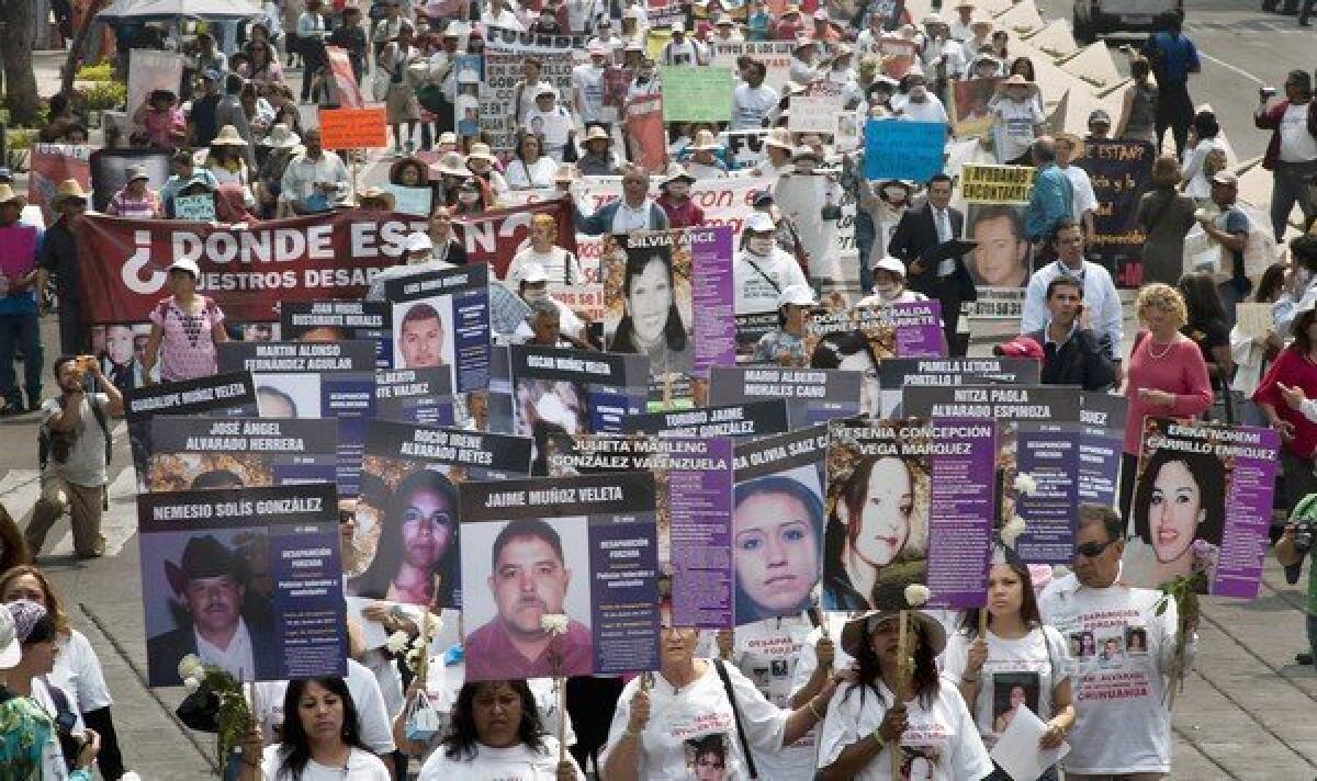 Hundreds of people demonstrate in May against drug violence -- specifically, forced disappearances -- in Mexico City. The violence is a major campaign issue in the upcoming presidential election.