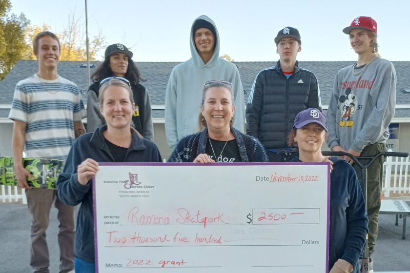Ramona Skatepark Champions representatives accept a $2,500 grant from Ramona Food & Clothes Closet.