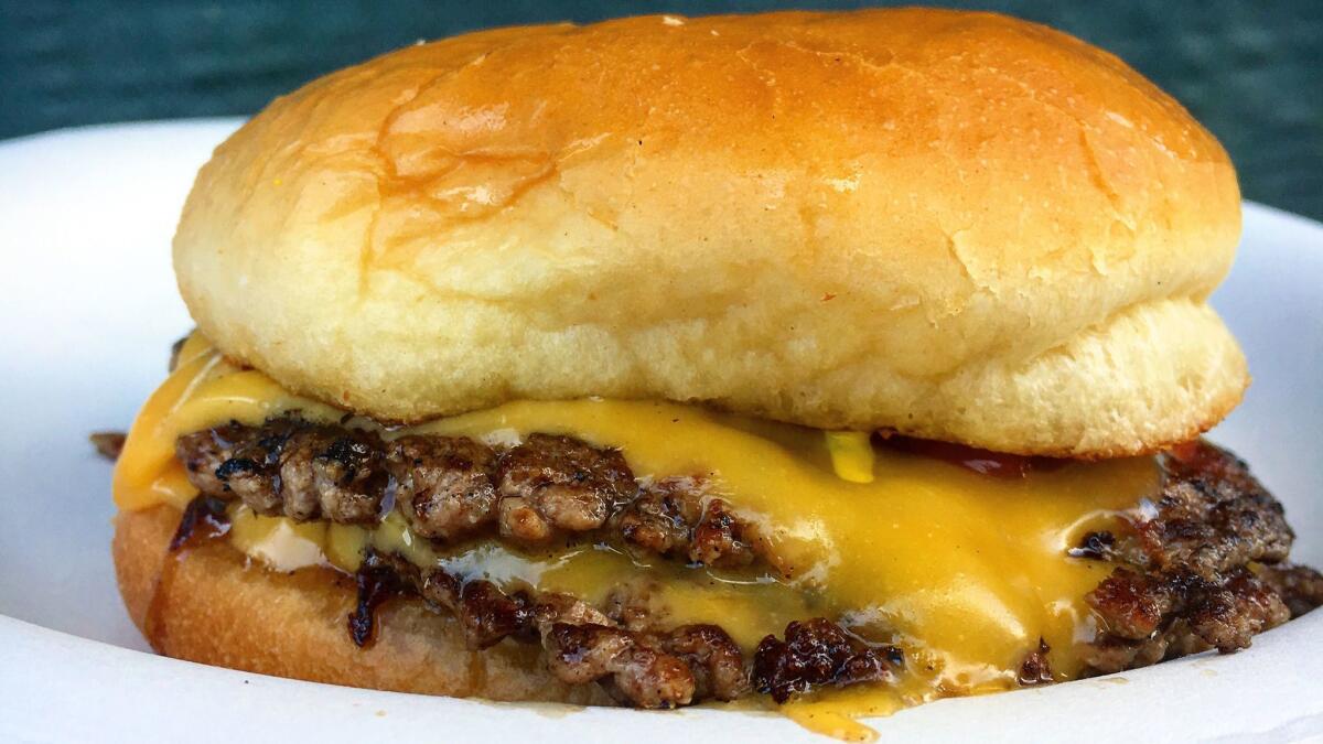 A double cheeseburger from the pop-up Burgers Never Say Die. The team behind the pop-up is opening a permanent space in Silver Lake.