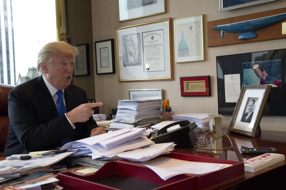Republican presidential candidate Donald Trump speaks during an interview with the Associated Press in his office at Trump Tower in New York on May 10, 2016.