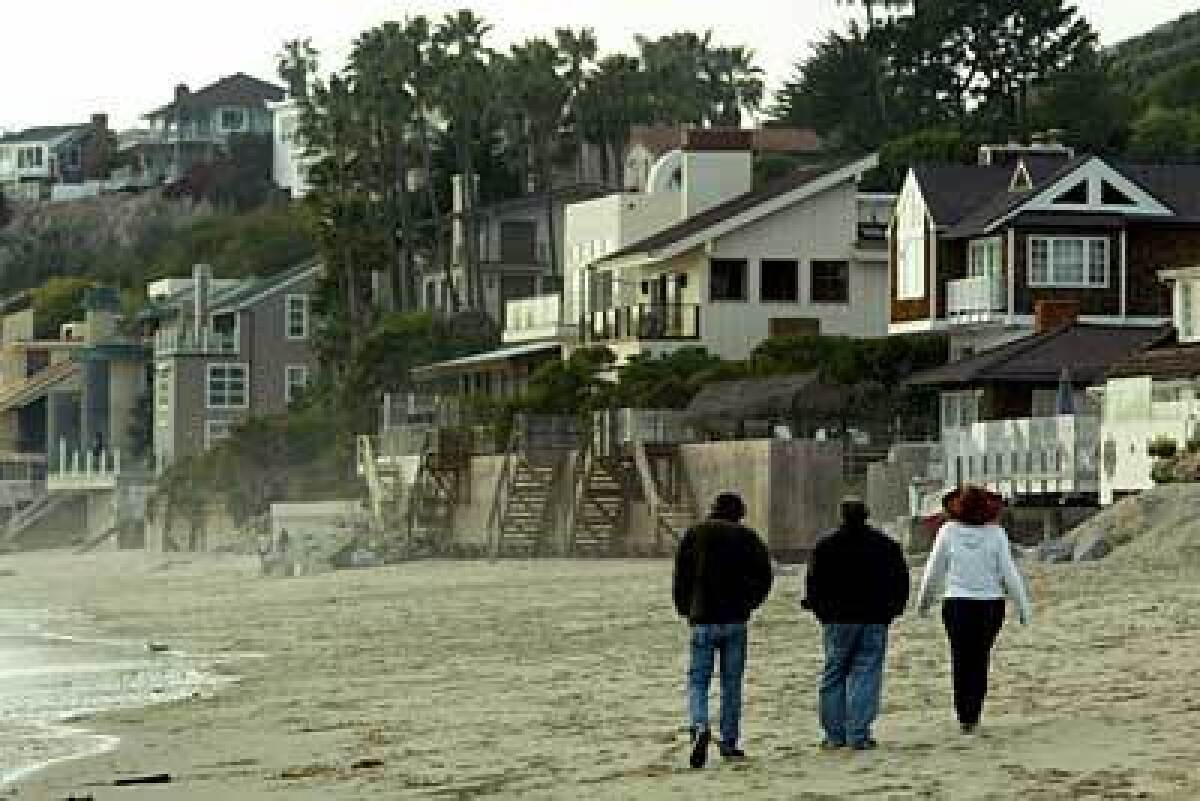 Waterfront homes in Malibu cost in the millions. The city's beaches are renowned for their surfing conditions.