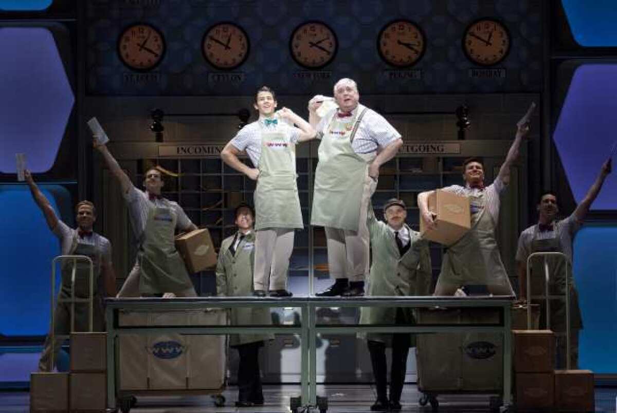 Nick Jonas and Rob Bartlett perform in a scene from "How to Succeed in Business Without Really Trying" at the Al Hirschfeld Theatre in New York.