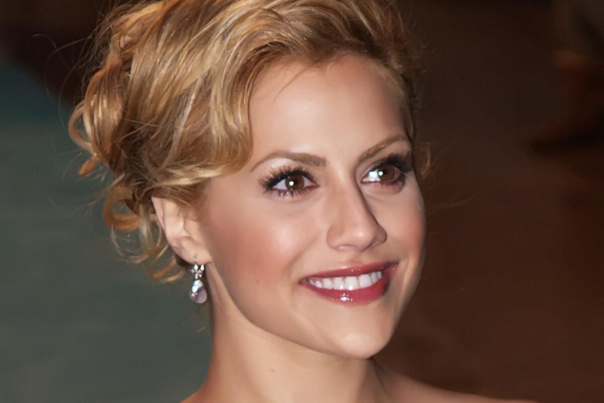 A closeup of Brittany Murphy's face.