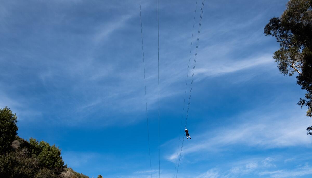 Soaring high on the Zip Line Eco Tour at Descanso Canyon.