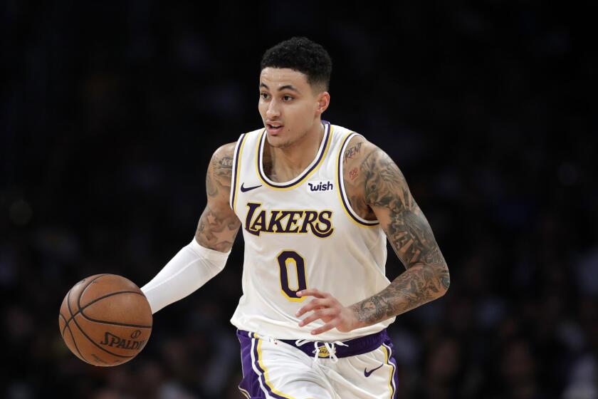 Los Angeles Lakers' Kyle Kuzma during an NBA basketball game Sunday, March 24, 2019, in Los Angeles. (AP Photo/Marcio Jose Sanchez)
