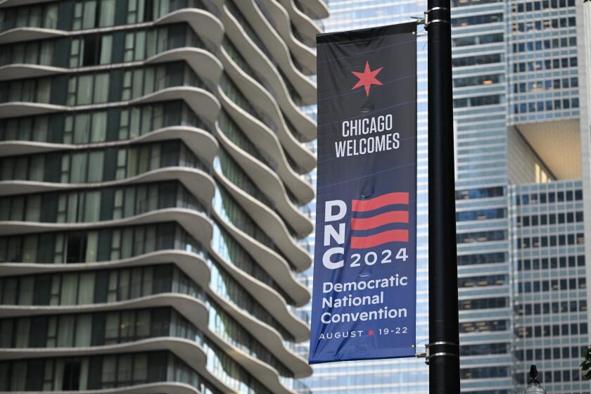 Banners announcing the upcoming Democratic National Convention (DNC) are seen in downtown Chicago in Chicago, Illinois on August 14, 2024. Vice President Kamala Harris will formally accept the party's nomination for president at the DNC which runs from August 19-22 in Chicago. (Photo by Robyn Beck / AFP) (Photo by ROBYN BECK/AFP via Getty Images)